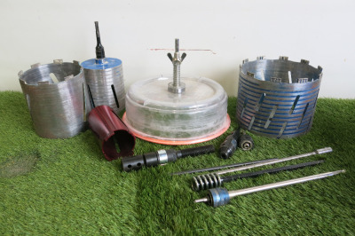 Lot Containing 5 x Large Hole Cutters, Comes with Other Attachments & Extensions (As Viewed).