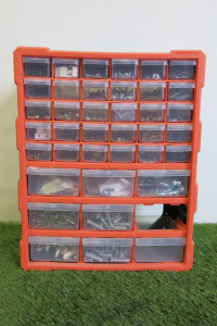 39 Drawer Storage Box Containing Various Size & Types of Screws, Nails, Plugs etc. (As Viewed). NOTE: missing one drawer.