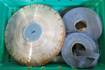 Assorted Diamond Cutting Disks & Various Sanding Belts. NOTE: crate not included.