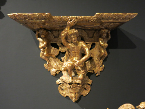 Gold Carved Shelf Bracket, Featuring Man & 2 Cherubs. Size H41 x W49 x D22cm.
