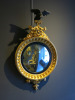 Regency Style Carved Giltwood Convex Mirror with Ebonised Eagle to Top. Size H100 x W55 x D17cm.