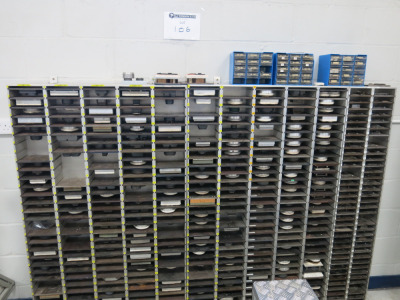 2 x Shelf Units with Approx 510 x Assorted Cutting Dies for Powder Puffs to fit Lots 101,102,103. NOTE: some with branding.