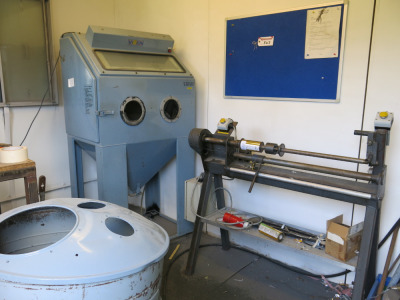 Contents of 20' Container to Include a Vixen Sand Blaster Cabinet, Foil Slitter, Small Linisher, Draper Parts Washer, Open Front Spray Booth (Small), Crates of Gold & Silver Foil, Plus Other Parts (As Viewed/Pictured). NOTE: excludes container.