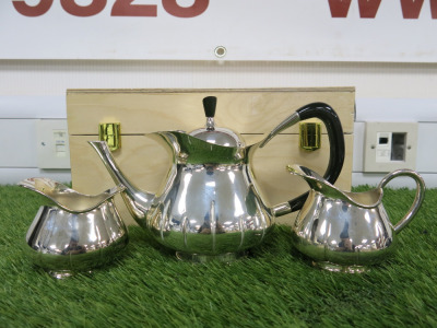 The East India Company Sterling Silver Tea Set Hallmarked 925 to Include: Tea Pot, Sugar Bowl & Milk Jug. Tea Pot Comes in Original Wooden Box. Weight 30oz.
