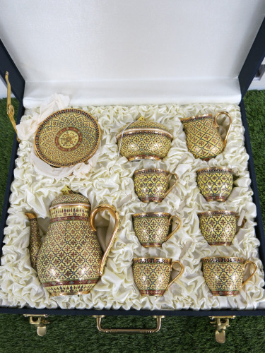 The East India Company Royal Bone China Benjarong 18ct Gold Hand Painted Tea Set in Presentation Case to Include: 1 x Tea Pot, 1 x Milk Jug, 1 x Sugar Bowl with Lid, 6 x Tea Cups & 6 x Saucers.