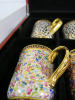 The East India Company Royal Bone China Banjarong 18ct Gold Hand Painted Set of 6 Assorted Mugs in Red Presentation Box. - 2