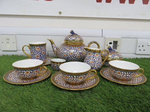 12 x Pieces of The East India Company Royal Bone China Benjarong 18ct Gold Hand Painted Crockery to Include: 1 x Tea Pot, 1 x Milk Jug, 1 x Sugar Bowl with Lid, 3 x Tea Cups & 3 x Saucers & 1 x Mug with Saucer & 1 x Small Cup. .