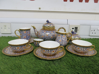 12 x Pieces of The East India Company Royal Bone China Benjarong 18ct Gold Hand Painted Crockery to Include: 1 x Tea Pot, 1 x Milk Jug, 1 x Sugar Bowl with Lid, 3 x Tea Cups & 3 x Saucers & 1 x Mug with Saucer & 1 x Small Cup. .