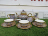 12 x Pieces of The East India Company Royal Bone China Benjarong 18ct Gold Hand Painted Crockery to Include: 1 x Tea Pot, 1 x Milk Jug, 1 x Sugar Bowl with Lid, 3 x Tea Cups & 3 x Saucers & 1 x Mug with Saucer & 1 x Small Cup. .