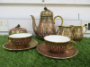 8 x Pieces of The East India Company Royal Bone China Benjarong 18ct Gold Hand Painted Crockery to Include: 1 x Tea Pot, 1 x Sugar Bowl with Lid, 2 x Milk Jugs, 2 x Tea Cups & 2 x Saucers.