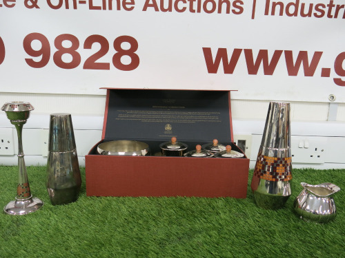 Lot Consisting of 10 Silver Plated Items to Include: 2 x Bowls, 4 x Cups with Lids, 1 x Sugar Bowl, 1 x Candle Stick Holder 2 x Cocktail Shakers.