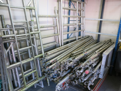 Approx 125 Assorted Pieces of Large Aluminium Scaffold Tower Component Parts to Include: 77 x Assorted Length Brace Bars, 32 x Stabiliser Legs, 9 x Frames, 3 x Stand Platforms & 4 x Trapdoor Platforms.