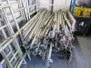 Approx 125 Assorted Pieces of Large Aluminium Scaffold Tower Component Parts to Include: 77 x Assorted Length Brace Bars, 32 x Stabiliser Legs, 9 x Frames, 3 x Stand Platforms & 4 x Trapdoor Platforms. - 2