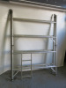 Approx 125 Assorted Pieces of Large Aluminium Scaffold Tower Component Parts to Include: 77 x Assorted Length Brace Bars, 32 x Stabiliser Legs, 9 x Frames, 3 x Stand Platforms & 4 x Trapdoor Platforms. - 29