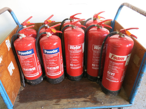 Quantity of Fire Extinguishers & Site Fire Extinguisher Stands to Include: 4 x Commander 9kg Powder Fire Extinguishers, 4 x Sentinel 9Lt Water Fire Extinguishers, 1 x Sentinel Foam 9Lt Fire Extinguisher, 9 x Mobile Double Fire Extinguisher Trolleys with 3