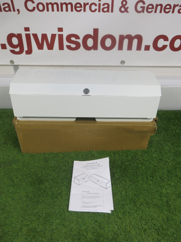 New 20"Metal Couch Roll Dispenser. Comes in Original Box with Instructions.