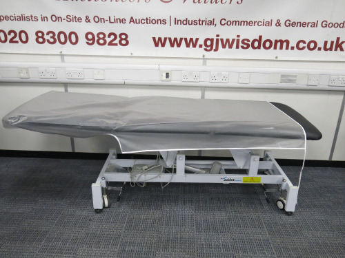 Addax Medical Electrical Adjustable Treatment Bed, Comes with Blue Bolster Pillow.
