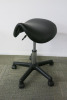Height Adjustable Black Saddle Massage Stool, with Black Legs.