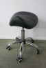 Height Adjustable Black Saddle Massage Stool, with Chrome Legs.