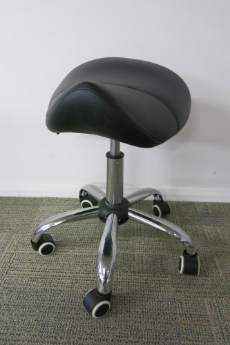 Height Adjustable Black Saddle Massage Stool, with Chrome Legs.