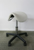 Height Adjustable White Saddle Massage Stool, with Black Legs.