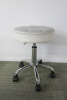 Height Adjustable Grey Crossed Design Medical Rolling Stool, with Chrome Legs.