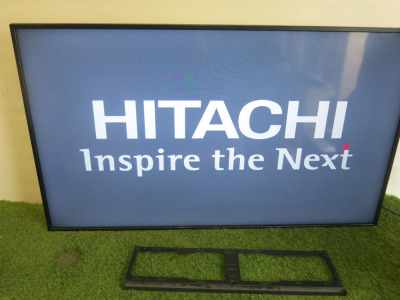 Hitachi 58" TV, Model 58HK6100UC with Wall Bracket. NOTE: missing remote.