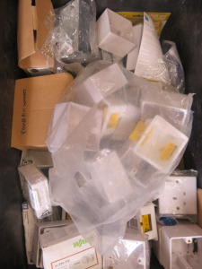 Crate Containing a Quantity of Electrical Plastic & Metal Switch Housings (As Viewed/Pictured). Crate Not Included.