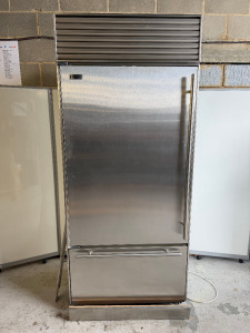 Sub-Zero Stainless Steel Integrated Fridge Freezer, Model 650/S, S/N M1831231. Size H214 x W90 x D65cm.