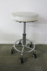 Height Adjustable White Medical Rolling Stool, with Chrome Legs.