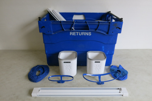 Lot of Coolsculpting Machine Attachment Equipment to Include: 16 x Attachment Protective Bonnets, 5 x Machine Attachment Holders, 3 x Slide-In Shelf for Machine Attachment Holders & Various Blue Machine Attachment Stands. NOTE: crates not included.