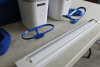 Lot of Coolsculpting Machine Attachment Equipment to Include: 16 x Attachment Protective Bonnets, 5 x Machine Attachment Holders, 2 x Slide-In Shelf for Machine Attachment Holders & Various Blue Machine Attachment Stands. NOTE: crates not included. - 3