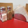 Lot Consisting of Assorted Condiments & Accessories to Include: 27 x Salt Pots, 27 x Pepper Pots, 27 x Napkin Stands & 23 x Plastic Serving Trays 46cm x 35cm