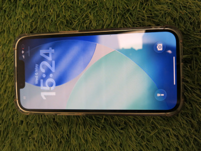 iPhone 13, 128GB, S/N JQG16D1Q1C, in Midnight Blue with Clear Case.