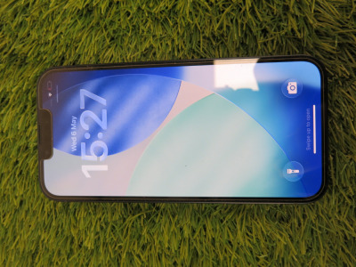 iPhone 13, 128GB, S/N MQO2L79VWV, in Midnight Blue.