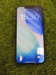 iPhone 13, 128GB, S/N FRFWM7196N, in Midnight Blue.