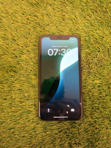 iPhone Xr, 64GB, S/N DX4DPABBKXK1, in Charcoal Grey.