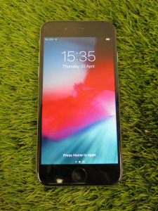 iPhone 6, 32GB, S/N FFPWJQS4HXR5, in Silver.