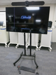 Board Room/Meeting Set Up, on Stand, to Include: Samsung 55" TV (Screen Damaged), ASUS Intel Core i7, 8th Gen SFF, Logi Rally Bar Camera & Speakerphone, Logi Rally Mic Pod, with Keyboard, Mouse & Remote.