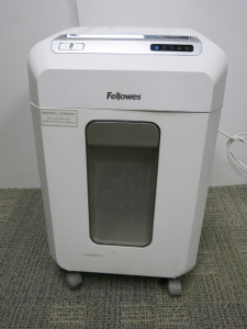Fellowes 12MS Paper Shredder. NOTE: one wheel missing.