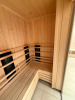 Harvia Fitted Sauna Unit with L Shape Seat, Glass Door & Front. Internal Size Approx 220 x 120 x H210cm. Located in Ladies Changing Rooms. NOTE: Located on-site Kensington High Street, requires collection by appointment only. The buyer will be required t - 6