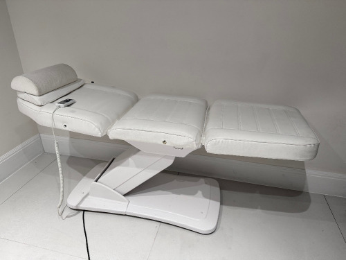 Electric 3 Section Treatment Couch. NOTE: missing arm attachments.