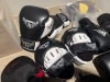 Assorted Boxing Gloves, Pads & Other to Include: 3 x Pairs of Boxing Gloves, 3 x Pairs of Pads, Skipping Rope, Weight Belt & Weightlifting Gloves (As Viewed) - 3