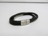 Black Woven Leather Bracelet with Silver Closure.