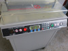 450VS+ Semi-Automatic Electric Paper Cutting Machine on Metal Cabinet. - 2