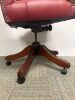 Reproduction Faux Oxblood Leather Captains Chair on Swivel Base. - 4