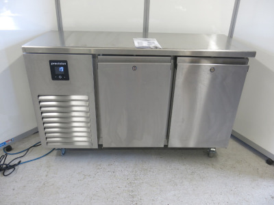 Precision Stainless Steel 2 Door Slim Line Refrigerated Counter, Model MCU223, S/N199113. Size H87 x W135 x D53cm. Comes with Keys & Operating Instructions. NOTE: installed new and appears never used.