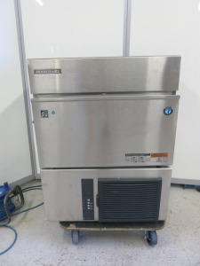 Hoshizaki Ice Maker, Model IM-65NE-HC, S/N N51431M. Size H84 x W63 x D50cm. Comes with Sauermann SI 1800 Pump & Plastic Scoop. NOTE: installed new and appears tested only as premises never opened.