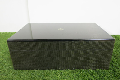 The East India Company Queen Elizabeth II Diamond Jubilee Carbon Fibre Coin Chest with Purple Velvet Interior, 2 x Silver Coin Information Books, Gold/Diamond Jewellery Magnifying Tool & 2 x Carbon Fibre & Purple Velvet Lined Trays. Comes with Original Bo