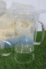 Large Lot of Glass Crockery to Include: Tea Pots, Cups, Jugs, Bottles etc. - 5